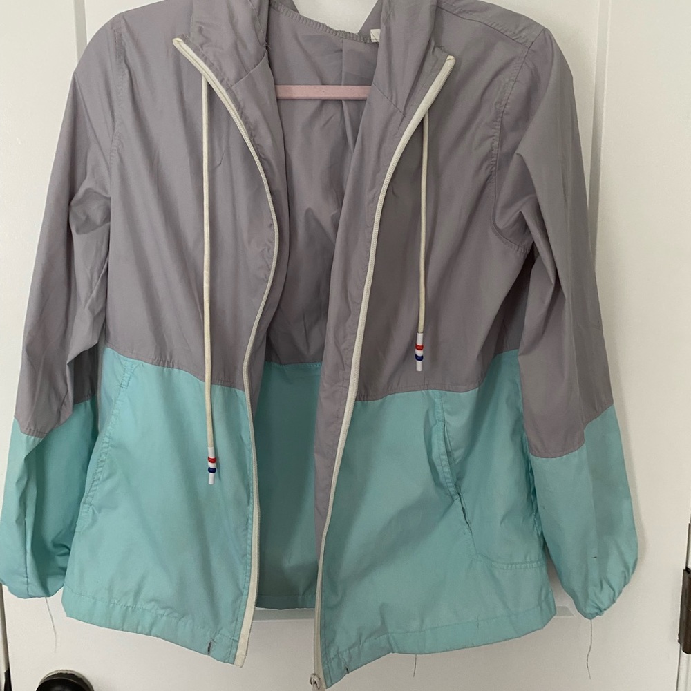 Gray and teal raincoat